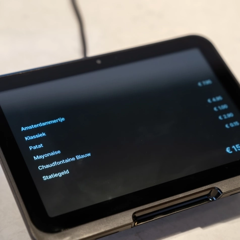 Bestellingen tonen en pinnen via één display